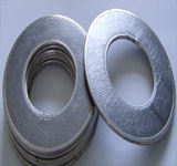 Tanged reinforced graphite gaskets